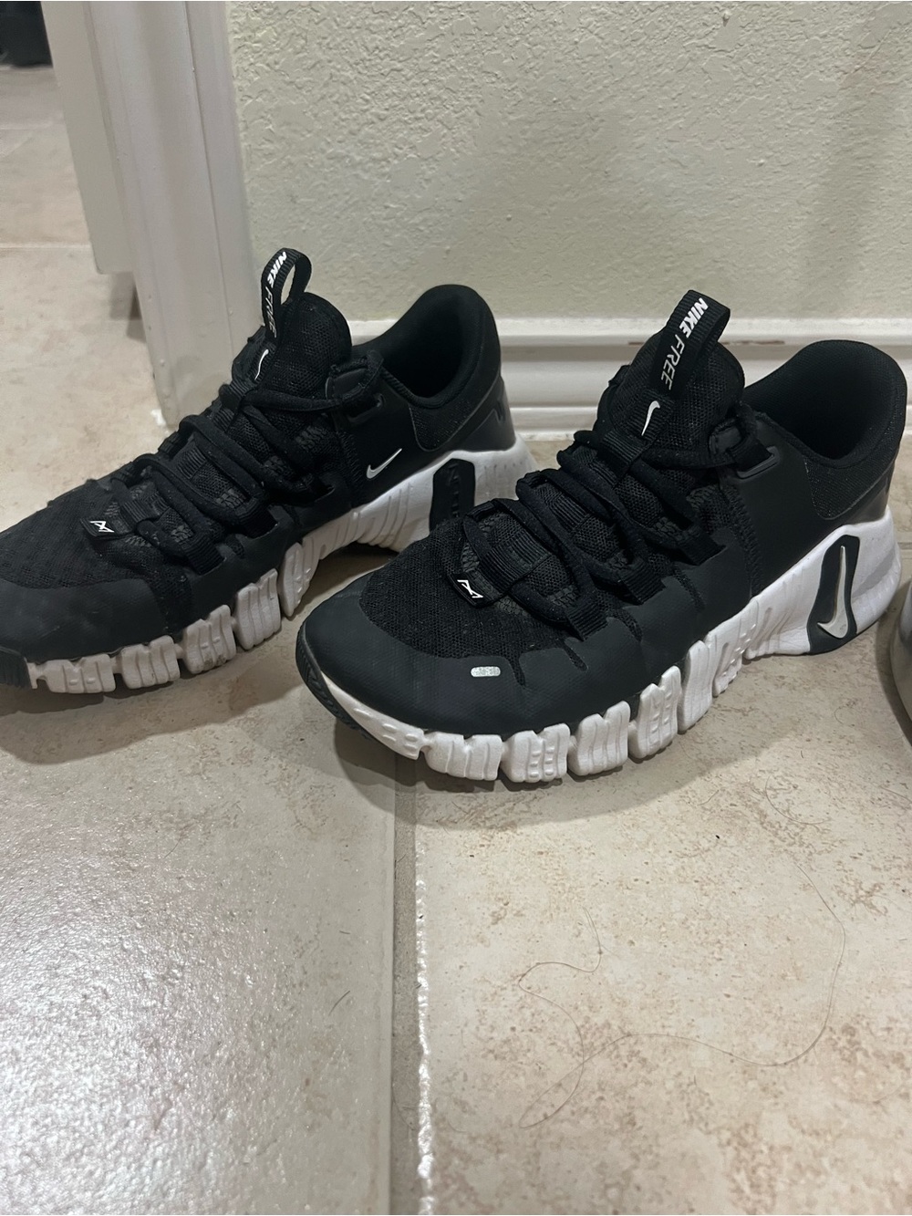Nike Metcon Black and White Cushioning Sneakers